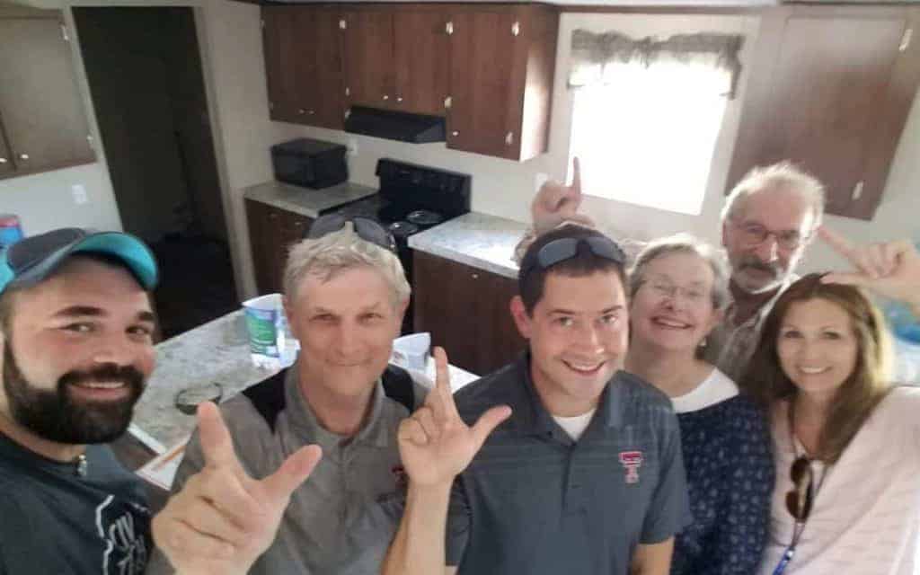 Photo of Texas Tech Professors and Alberto Piña in Braustin model home.