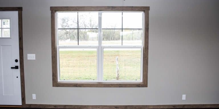 Tape and textured wall with window and door