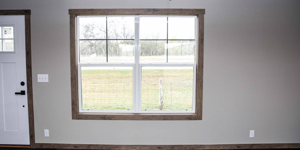 Tape and textured wall with window and door