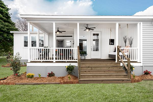 Porch and landscaping making mobile home look like a site-built home