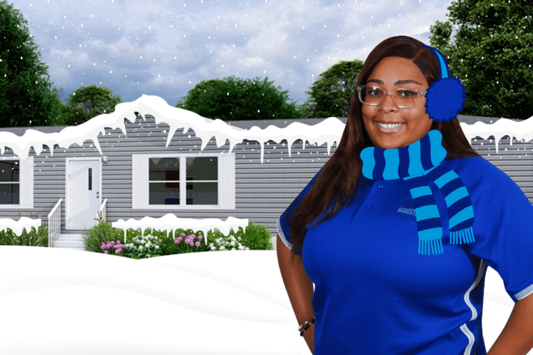 Woman wearing blue scarf infront of the mobile home