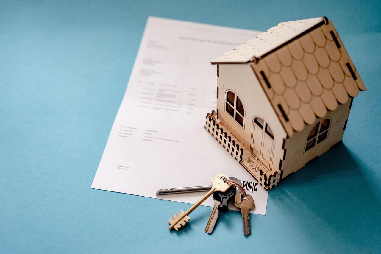 A small model home with keys