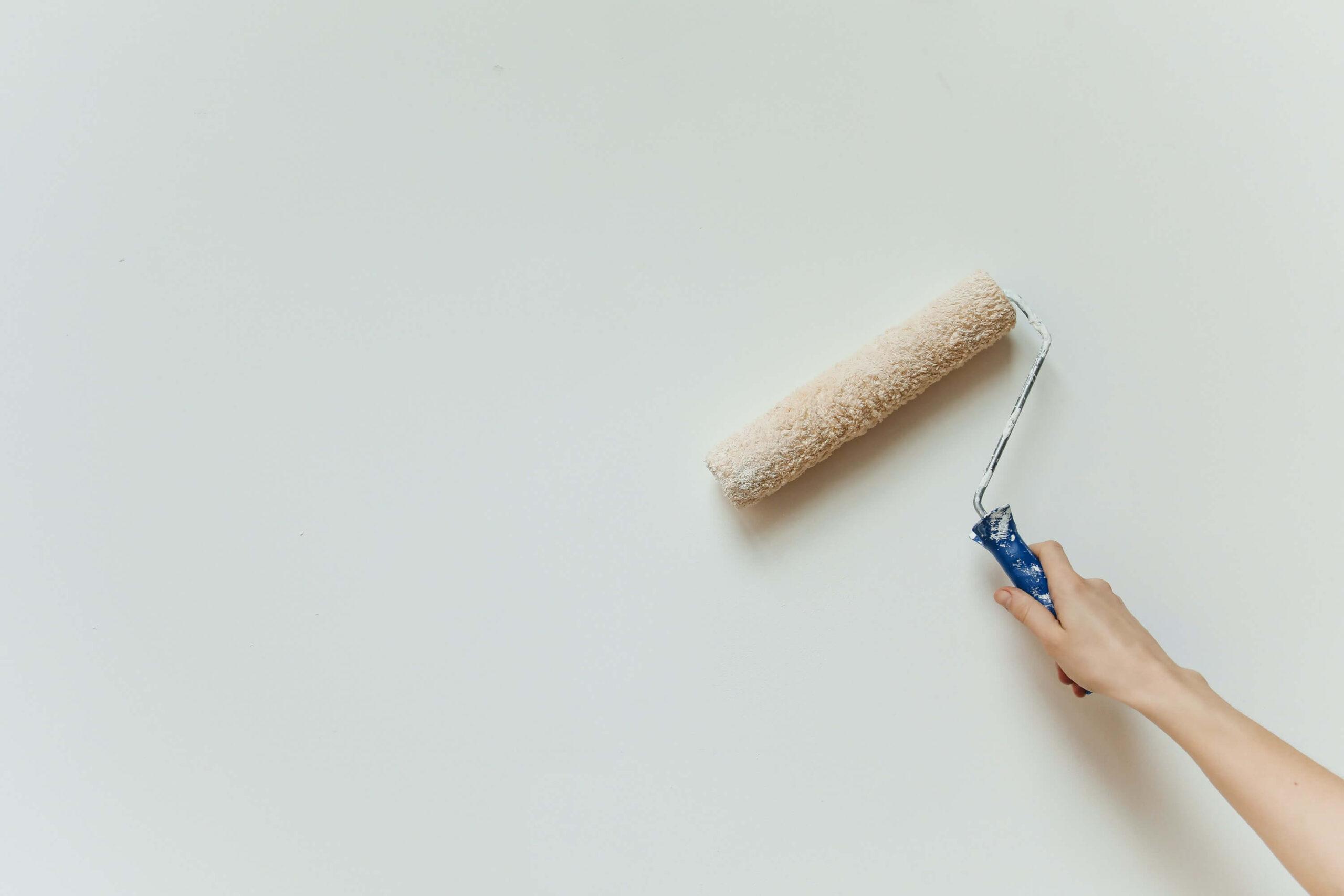 Painting mobile home walls with a roller