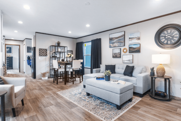 Clayton Homes Bonham Series Desire Single Wide Manufactured Home Interior Living Room and Dining Area with Large Windows