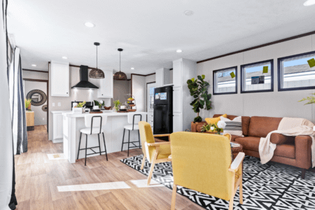 Clayton Homes Bonham Series Spirit Single Wide Manufactured Home Interior Kitchen and Living Room Space