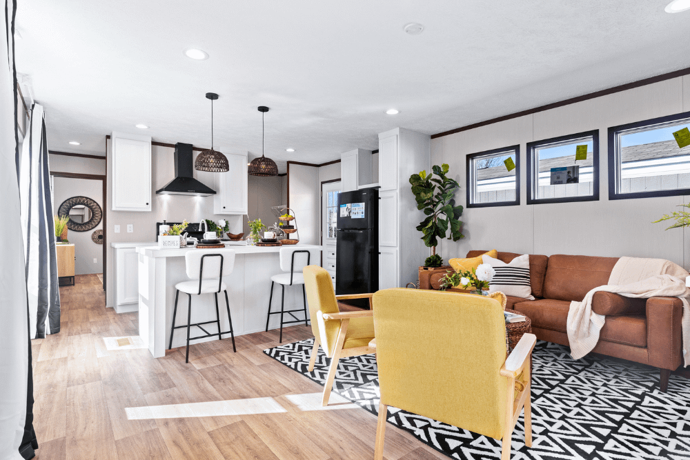 Clayton Homes Bonham Series Spirit Single Wide Manufactured Home Interior Kitchen and Living Room Space
