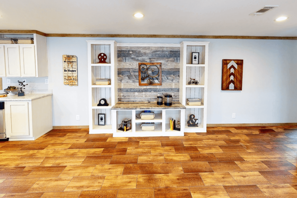 Oak Creek TXR Isabel Single Wide Manufactured Home Interior Open Concept Living Area with Entertainment Wall and Built-in Shelving