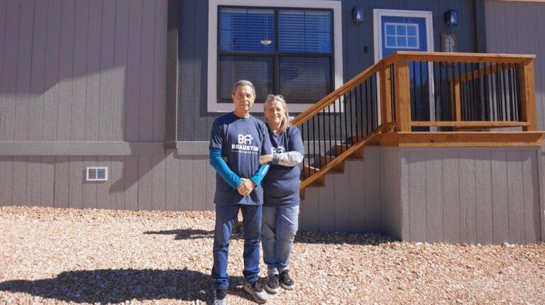 A couple moving into their new mobile home