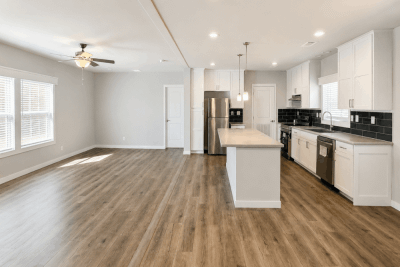 Karsten ABQ K2760B Double Wide Manufactured Home Interior Open Floor Plan Living and Kitchen Area