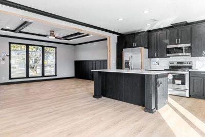 Clayton Schult Alpine The Sierra Double Wide Manufactured Home Interior View Open Concept Kitchen and Living Space